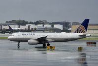 N428UA @ KSFO - Rainy morning SFO 2020.