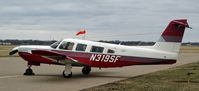 N319SF @ KDVN - Tie downed on the Carver Aero Ramp - by Floyd Taber