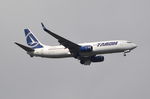YR-BGL @ EGLL - Boeing 737-8H6 on finals to London Heathrow. - by moxy