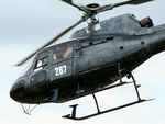 VH-BUK @ YSRI - Close-cropped rear Port side view of the front end of ‘JoyFlight’ Squirrel AS-350BA helicopter VH-BUK Firebird 287 at RAAF Base Richmond YSRI NSW during the Australian Defence Force Airshow on 22Oct2006. The helo had an unusual dark grey livery.