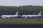 VP-BMQ @ EHTW - Undelivered Airbus A220-300s stored at Twente airport, the Netherlands. VP-BMQ to the right (VP-BMU left). Destined for lease to Red Wings Airlines of Russia, but cancelled. Waiting for a new customer