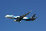N379AZ @ KCVG - Off runway 27 on a pretty day - by Charlie Pyles