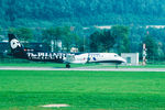 HB-IZK @ LSZA - At Lugano-Agno. Special livery. Scanned from a slide.
