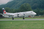 HB-IZS @ LSZA - Taking off from Lugano-Agno. Scanned from a slide.