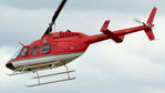 VH-SHK @ YSRI - Close-cropped rear Port-side view of ‘JoyFlight’ Sydney Helicopters Bell 206L-1 LongRanger helicopter VH-SHK Cn 45323 Firebird 277 departing RAAF Base Richmond YSRI NSW during the Australian Defence Force Airshow on 22Oct2006.
