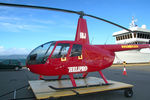 ZK-IBJ @ NZQW - Close-cropped front Portside view of Helipro Robinson R44 Raven ZK-IBJ Cn 1008 parked on a ground handling platform at NZQW Wellington - Queens Wharf Heliport NZ - on 14Apr2010. - by Walnaus47