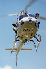 N22-016 - RAN Squirrel AS-350B helicopter N22-016 Code 863 Cn 1740, from 723 Sqn Nowra, arrives for static display in sunny conditions on the Treasury lawns, Canberra, on 17Mar1997. The occasion was Canberra Day 1997. Front Stbd under-side view of Squirrel N22-016.