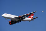 G-VIRG @ JFK - Didn't really notice the bird, but it appears to be an eagle, but at JFK? - by Charlie Pyles