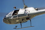N22-016 - RAN Squirrel AS-350B helicopter N22-016 Code 863 Cn 1740, from 723 Sqn Nowra, arrives for static display in sunny conditions on the Treasury lawns, Canberra, on 17Mar1997. The occasion was Canberra Day 1997. Front-end underside view of airborne N22-016.