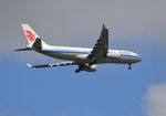 B-6090 @ EGLL - Airbus A330-243 on finals to London Heathrow. - by moxy