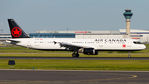 C-GIUF @ CYYZ - Vacating runway 23 with the CYYZ ATC Tower and the CN Tower in the background. - by Tim Lowe