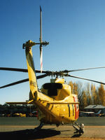 VH-NSO @ YCOM - Rear view of parked NSCA Bell 412EP VH-NSO Cn 33089 (Code 11), at Cooma Airport YCOM NSW during the 'Snow Opening' Airshow on 11May1986. (Helo with NSCA 08MAR85 - 29MAY89 - later Sold to USA as N167EH.)