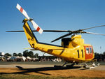 VH-NSO @ YCOM - Rear Stbd view of parked NSCA Bell 412EP VH-NSO Cn 33089 (Code 11), at Cooma Airport YCOM NSW during the 'Snow Opening' Airshow on 11May1986. (Helo with NSCA 08MAR85 - 29MAY89 - later Sold to USA as N167EH.)