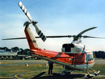 VH-AHH @ YSCB - Rear Stbd view of parked Bell 412 Helicopter VH-AHH Cn 33084 Code H, photographed at Canberra Airport in Mar 1987. Note pop-out floats on the skids. (Later Regd to NSCA as VH-NSV 16JUN87 - 28MAY89.) Previously Registered as N3172D in USA. - by Walnaus47