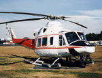 VH-AHH @ YSCB - Front Stbd view of parked Bell 412 Helicopter VH-AHH Cn 33084 Code H, photographed at Canberra Airport in Mar 1987. Note pop-out floats on the skids. (Later Regd to NSCA as VH-NSV 16JUN87 - 28MAY89.) Previously Registered as N3172D in USA. - by Walnaus47