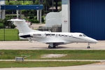 N909NK @ KFLL - Parked on private ramp - by Robert Kearney