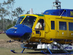 N234PH @ YBUD - Close cropped Front Portside view of cabin of McDermott Aviation Bell 214B-1 Biglifter N234PH Cn 28050 parked at Bundaberg Airshow at Bundaberg Airport YBUD on 16Jul2005. Equipped with ‘under-cabin’ water tank, and ‘pick-up’ hose. - by Walnaus47