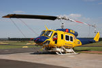 VH-SUH @ YLTV - Front Portside view of McDermott Aviation Bell 214B-1 VH-SUH Cn 28017 HeliTack 339, taken at Latrobe Valley Airport (YLTV) Morwell on 22Feb2015. Fitted with a ‘HeliLift’ water/ fire retardant tank under the cabin.