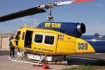 VH-SUH @ YLTV - Rear Portside view of cabin of McDermott Aviation Bell 214B-1 VH-SUH Cn 28017 HeliTack 339, at Latrobe Valley Airport (YLTV) Morwell on 22Feb2015. Fitted with a ‘HeliLift’ water/ fire retardant tank under the cabin.