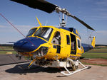 VH-SUH @ YLTV - Close-cropped Front Portside view of cabin of McDermott Aviation Bell 214B-1 VH-SUH Cn 28017 HeliTack 339, at Latrobe Valley Airport (YLTV) Morwell on 22Feb2015. Fitted with a ‘HeliLift’ water/ fire retardant tank under the cabin. - by Walnaus47