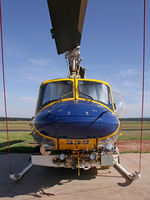 VH-SUH @ YLTV - Front view of McDermott Aviation Bell 214B-1 VH-SUH Cn 28017 HeliTack 339, at Latrobe Valley Airport (YLTV) Morwell on 22Feb2015. Fitted with a ‘HeliLift’ water/ fire retardant tank under the cabin. - by Walnaus47