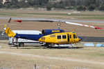 N234PH @ YPJT - Stbd view of McDermott Aviation Bell 214B-1 Biglifter N234PH Cn 28050 under maintenance at Jandakot Airport YPJT West Australia on 18Nov2013. Equipped with ‘under-cabin’ water tank, with ‘pick-up’ hose, wearing Code Helitack 673. - by Walnaus47