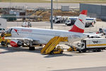 OE-LXA @ LOWW - Loading up before departure - by Robert Kearney