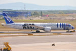 JA873A @ LOWW - Being towed to parking - by Robert Kearney