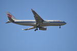 B-6080 @ EGLL - Airbus A330-243 on finals to 9R London Heathrow. - by moxy