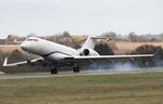 B-605D @ EGGW - ZYB Lily Global 6000 smoking the tyres on landing at LTN - ex N788ZJ airframe - by dave226688