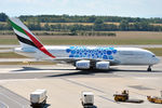 A6-EOT @ LOWW - Turning in to parking - by Robert Kearney