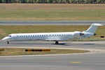 ES-ACL @ LOWW - Taxiing out for departure - by Robert Kearney