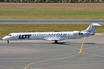 ES-ACK @ LOWW - Taxiing out for departure - by Robert Kearney