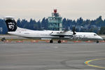 N404QX @ KSEA - Taxiing out for departure - by Robert Kearney