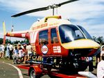 VH-HRS @ YSFS - Close-cropped front Stbd view of trailer- mounted ‘Surf Life Saving Association’ Bell 206A VH-HRS (on modified skid landing gear) on static display at the Schofields Air Show (held at HMAS Nirimba) YSFS NSW on 10Nov1985. MSN/Cn Unknown. (Not a B412SP)