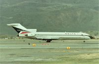 N405DA @ KRNO - KRNO - Delta 727 landing runway 16R at Reno Tahoe Inlt Airport - date apprx Jan 1990. - by Tom Vance