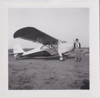 N82117 - Herman Lee Walker with plane he co-owned with friend, possibly at the Monmouth, Warren, IL, airport.  First entry in log book w/ this plane was Feb. 1948.  Last was Sep 1953. - by Pamela West