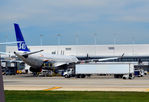 LN-RKN @ KORD - At the gate O'Hare     Erik Viking - by Ronald Barker