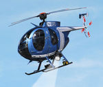 N220PD - One of two helicopters used by the Oakland Police Department - by Chris Humphrey