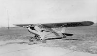 N6389H - N6389H parked at the Tupelo, Mississippi, airfield in the 1950s.  It was painted grey with red trim and had gray and red plaid seat covers to be different. - by Helen Wesson