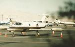 N464CL @ KLAS - N464CL at KLAS. Scanned from print. Minolta X-570 with 210mm f4.2 lens. At Signature Flight Support, Las Vegas, 24-SEP-96. This was durning the NBAA  Convention. - by Jay Flitton