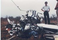 N52768 @ LBX - Looking over the crashed plane. - by Unknown