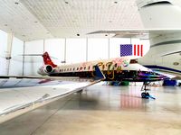 M-SIYU @ TUL - 1999 Bombardier BD-700-1A10 Global Express SiYu fireworks and stars livery - by Aaron C.