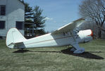 N69128 @ 44PA - I'm using Pennfield Farm as the location, but I don't remember for sure. I know it was a grass strip in the valley when we did the Air Mail Flyers Fly-In in 1984. If you recognize the building, please let me know. - by Charlie Pyles