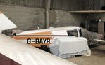G-BAYR - Wingless fuselage intact in the hangar at Old Hay Airfield, Kent - by Chris Holtby