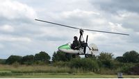 G-BUIG - Robin Braithwaite enjoying the delights of his Campbell Cricket Replica at Deenthorpe. - by Michael Smith