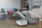 G-BUCK @ EGBT - Part dismantled and stored in hangar at Turweston, Bucks. - by Chris Holtby