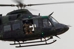 146492 @ CYXX - I managed a wave from a very intimidating member of our military. - by Guy Pambrun
