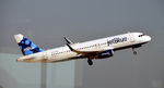 N834JB @ KJFK - Takeoff JFK - by Ronald Barker