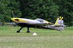 F-HXAL @ LFFQ - Extra EA-300SC, Landing, La Ferté-Alais (LFFQ) air show 2016 - by Yves-Q
